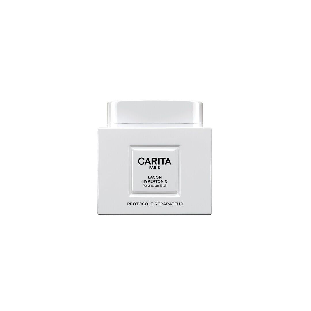 Un vasetto quadrato bianco puro di Carita Lagon Hypertonic «Protocole Reparateur». La sua estetica minimalista riflette la promessa di una riparazione intensa e di un'idratazione profonda, per una pelle serena.